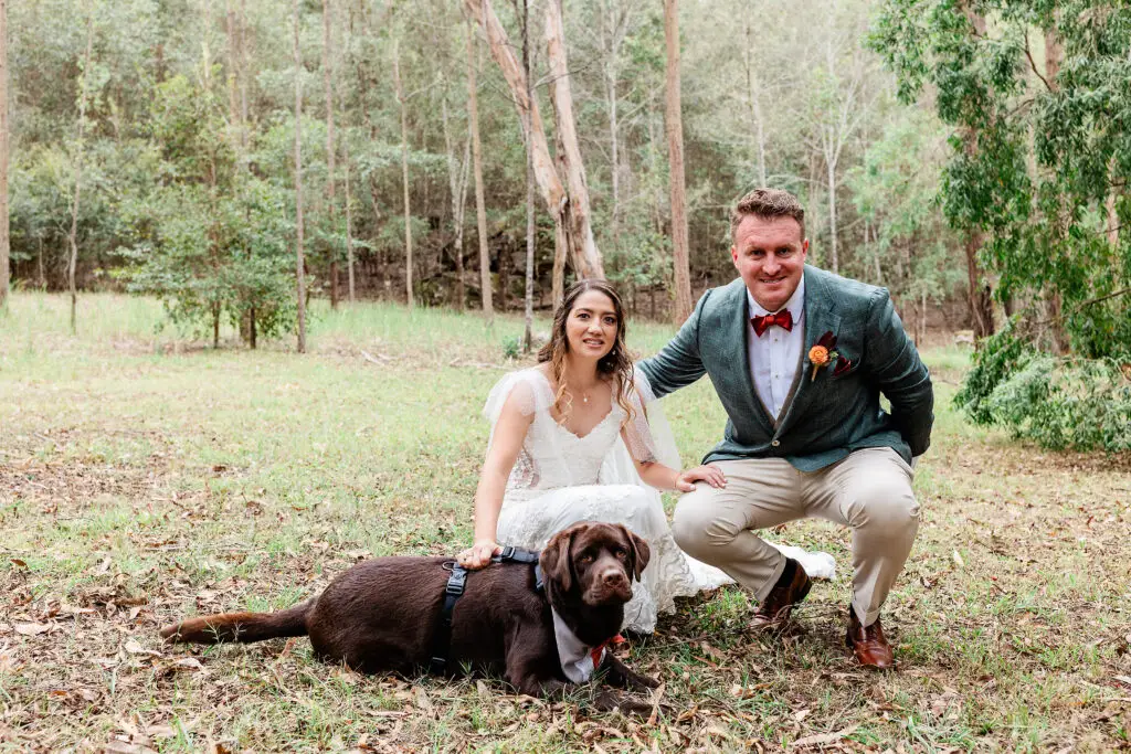 couple and their dog at mystwood dog friendly wedding venue
