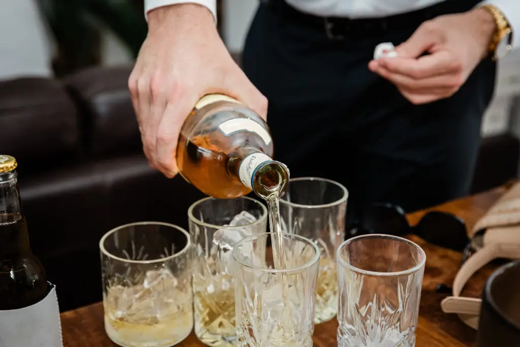 drink being served in the cabin at Mystwood Wedding Venue