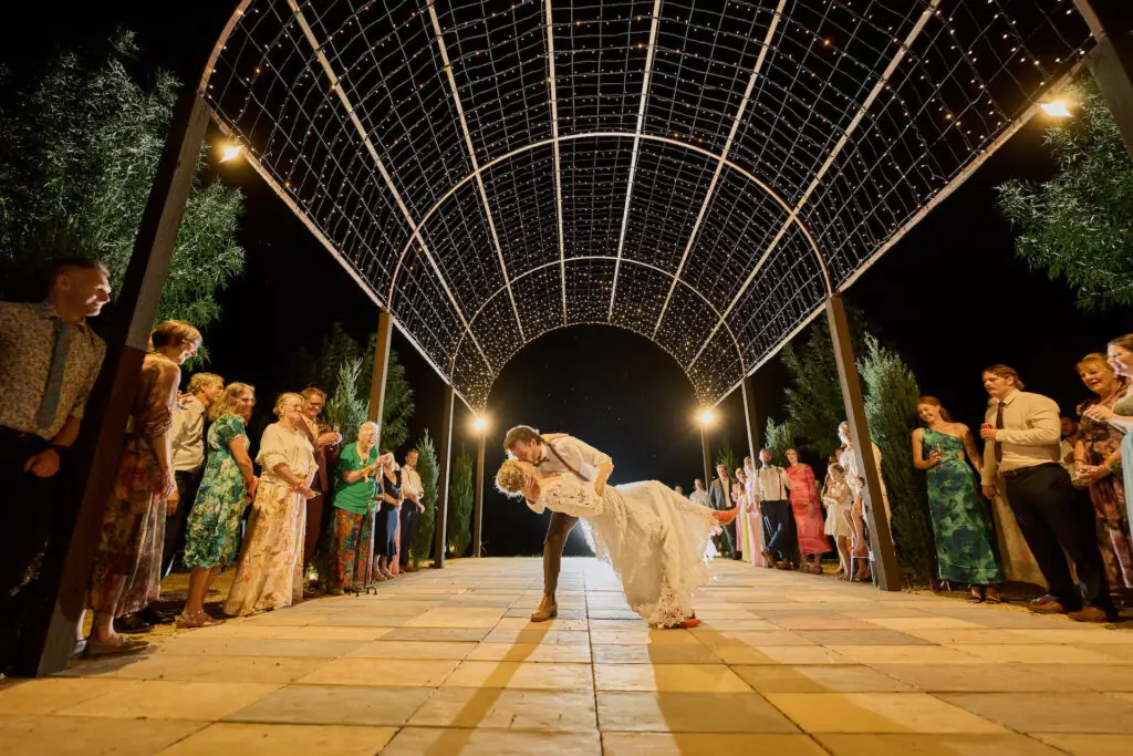 Couple kissing under the fairy lit dome of Mystwood - Hunter Valley Wedding Venue
